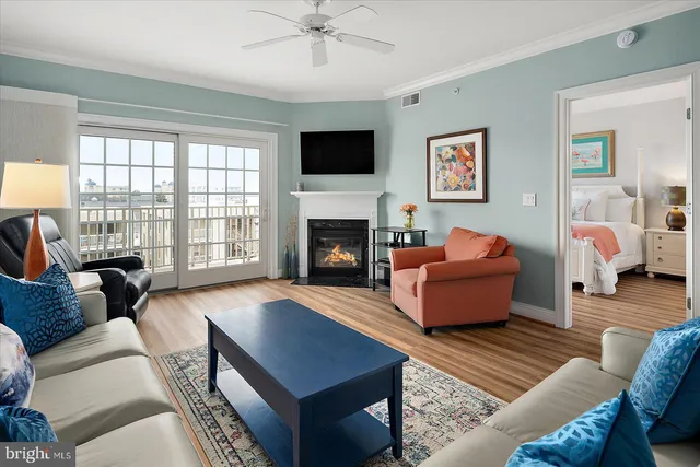 a kitchen with kitchen island granite countertop a sink stainless steel appliances and cabinets