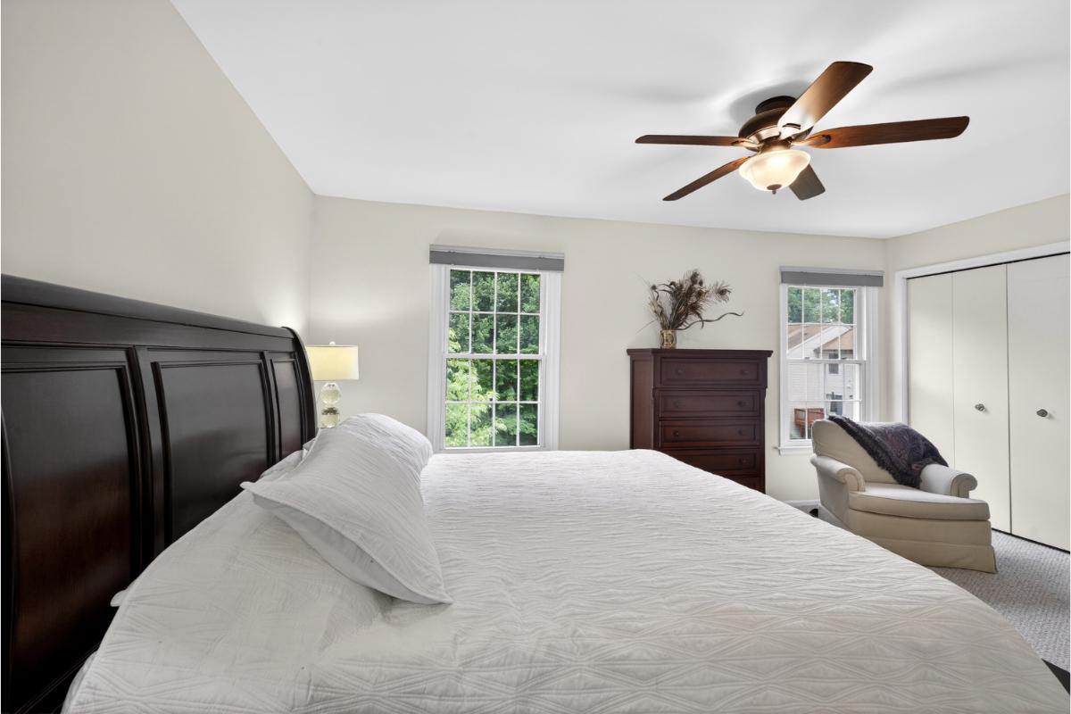 7347 Swan Point Way, Unit 122 Columbia, MD 21045 - Photo 26 of 54 a bedroom with a large bed and a window