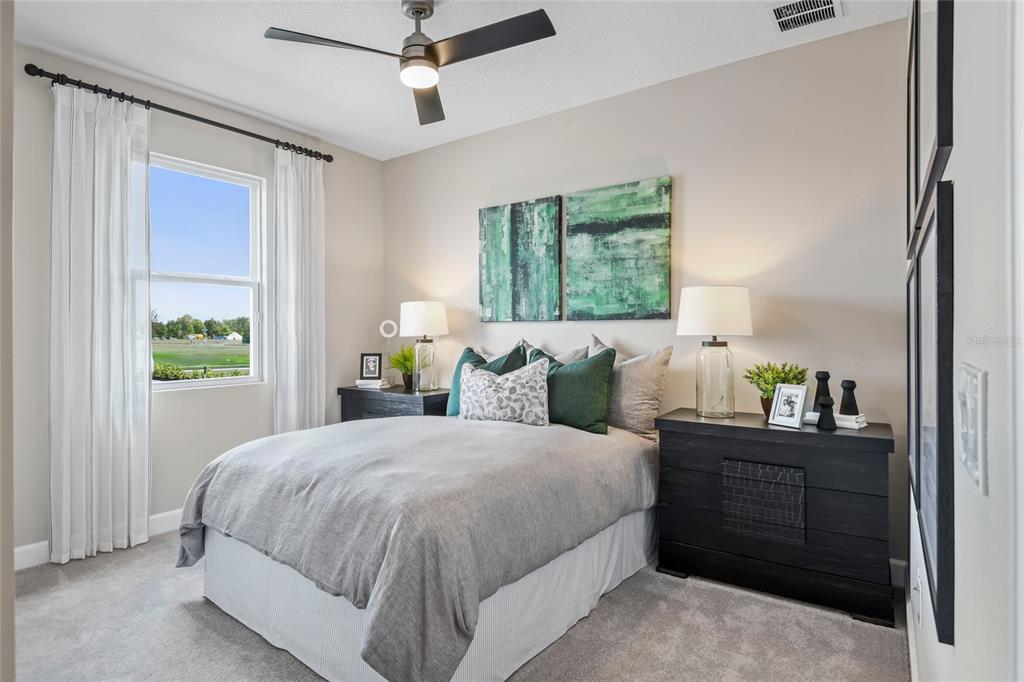 6418 Clover Street Lake Hamilton, FL 33844 - Photo 13 of 14 a bedroom with a bed and a window