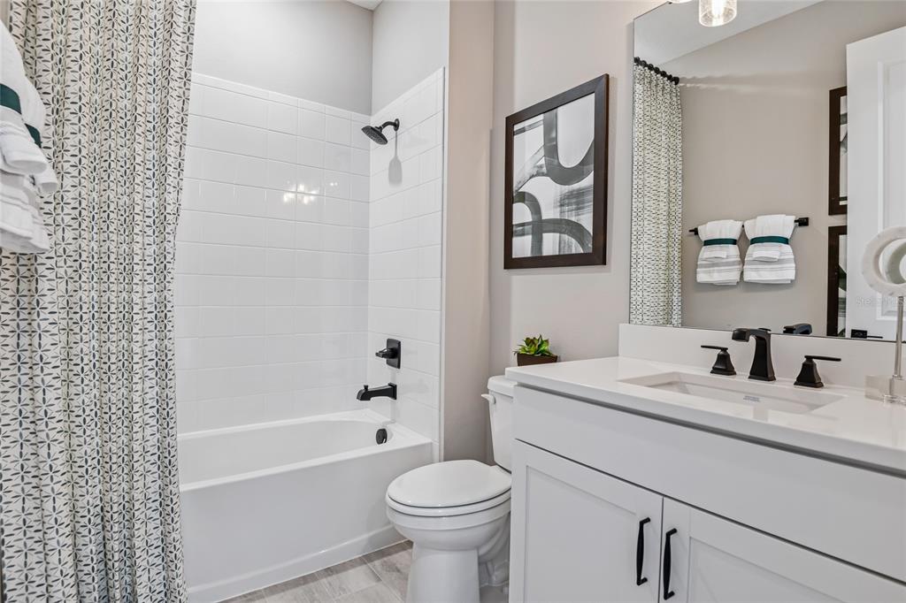 6418 Clover Street Lake Hamilton, FL 33844 - Photo 3 of 14 a bathroom with a sink toilet and a bathtub