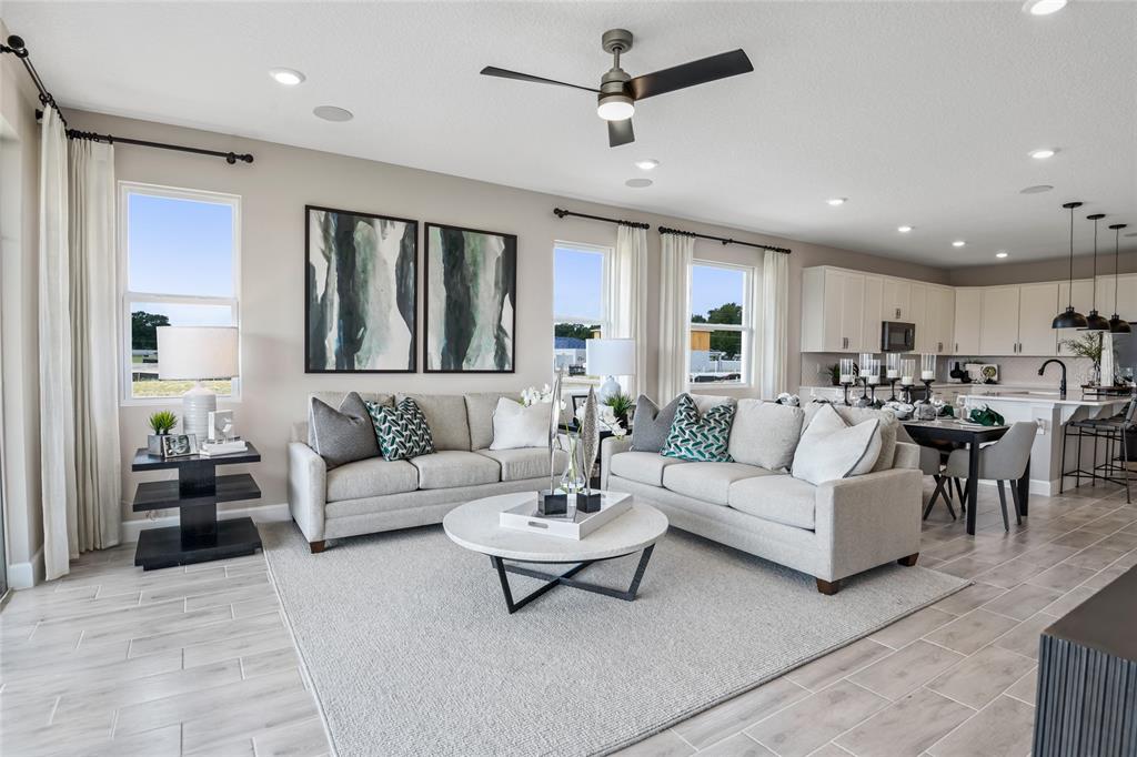6418 Clover Street Lake Hamilton, FL 33844 - Photo 8 of 14 a living room with furniture and a large window