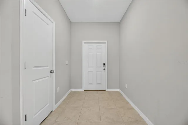 a view of a kitchen with furniture and a kitchen