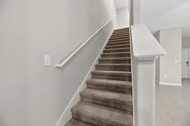 a bathroom with a sink toilet vanity and shower