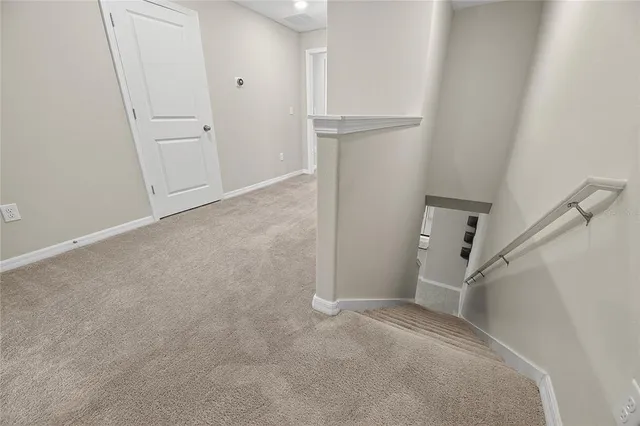 a bathroom with a shower and a toilet