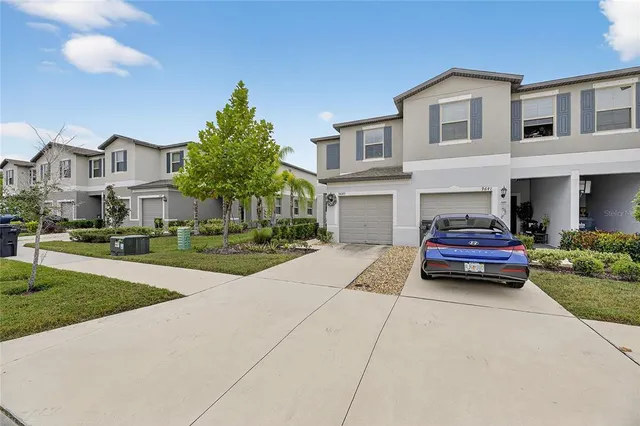 a house view with a garden space