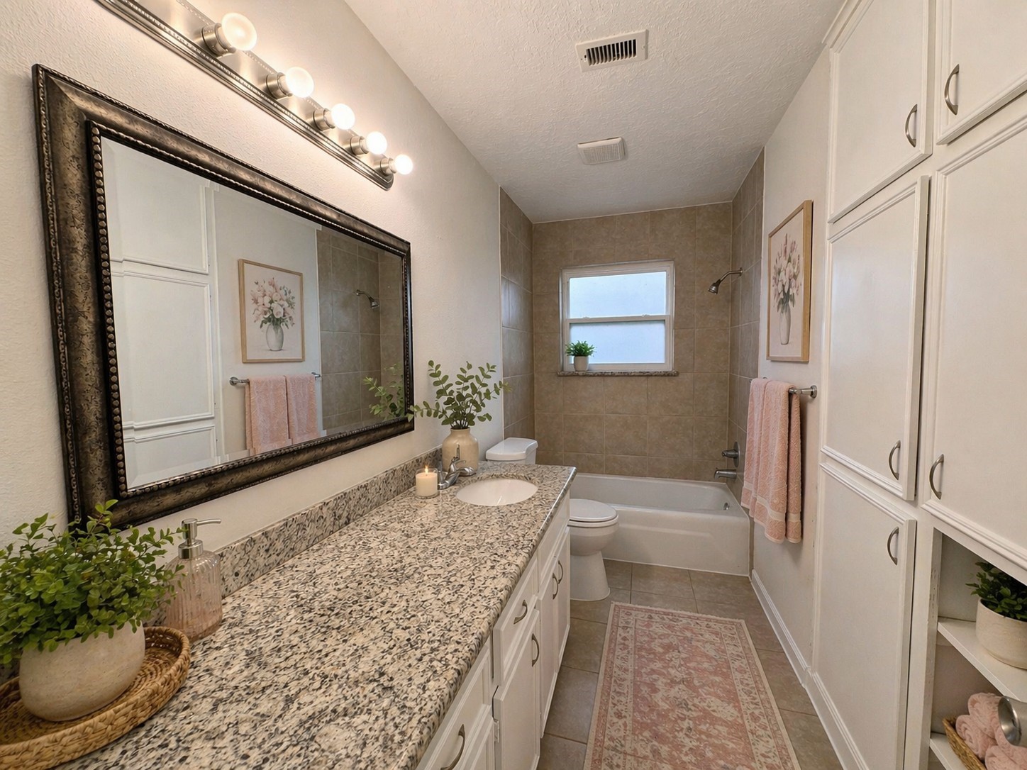 2402 Barak Lane Bryan, TX 77802 - Photo 15 of 25 a bathroom with a granite countertop sink and a mirror