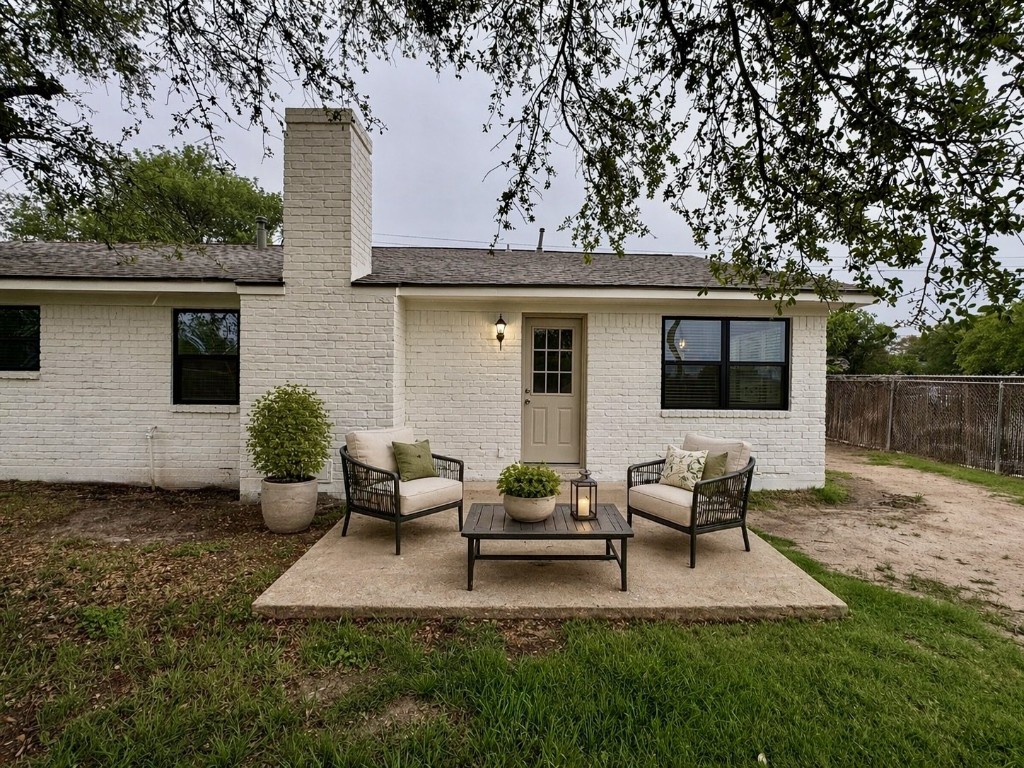 2402 Barak Lane Bryan, TX 77802 - Photo 16 of 25 a view of a house with backyard and sitting area