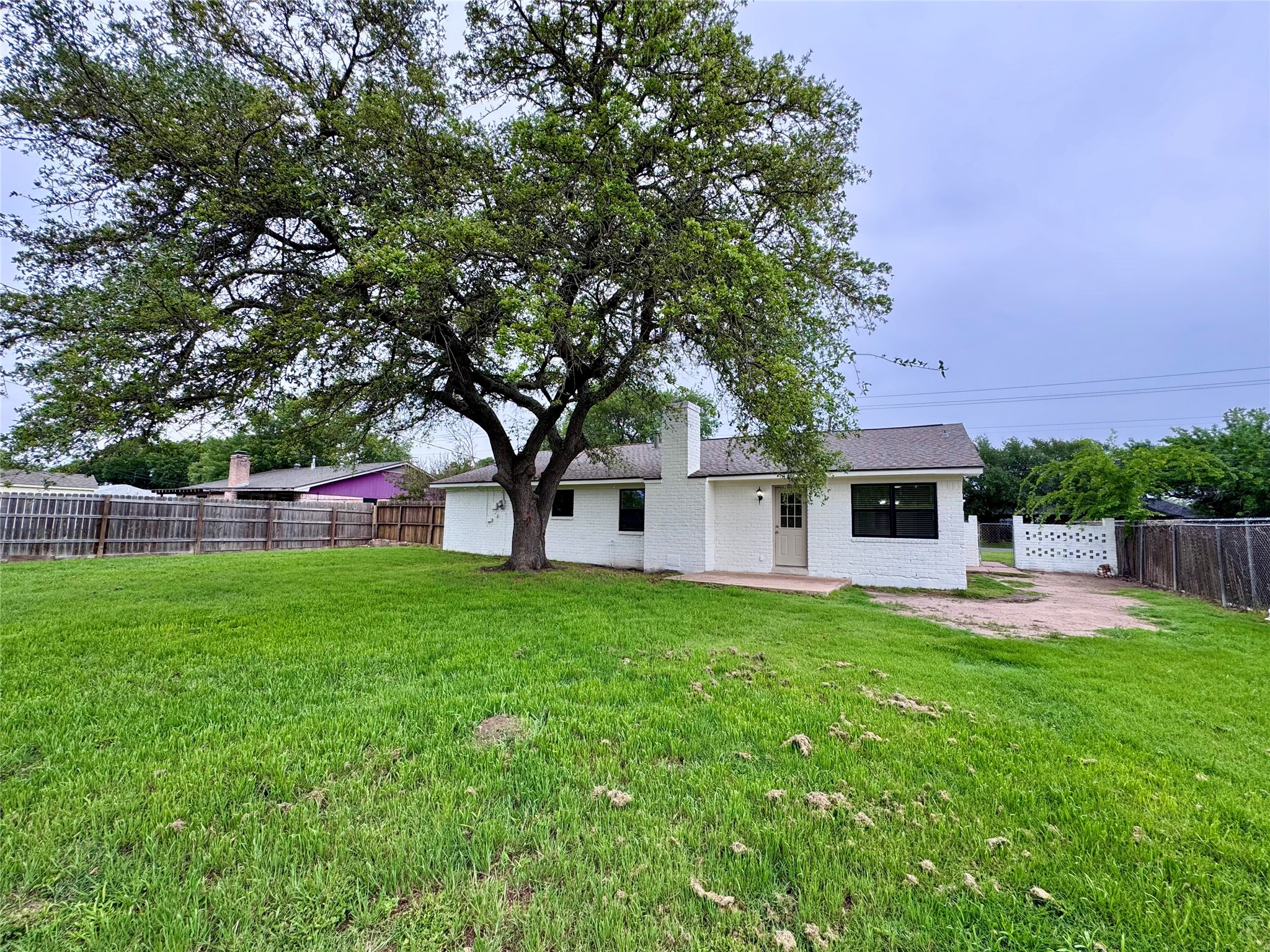 2402 Barak Lane Bryan, TX 77802 - Photo 25 of 25 a house view with a sitting space and garden