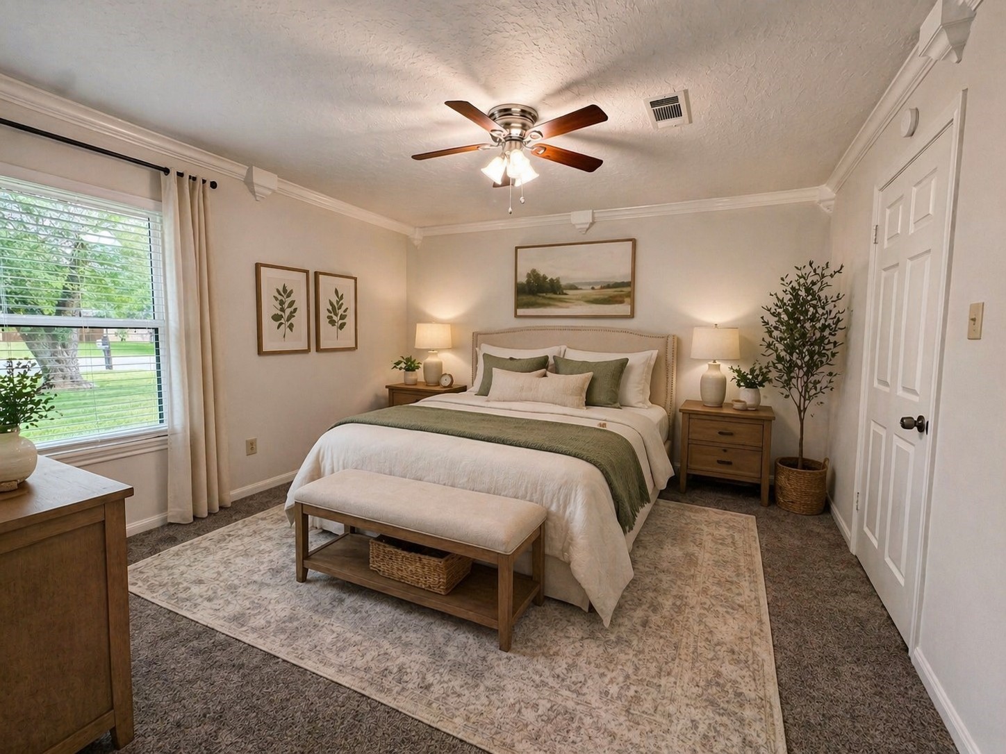 2402 Barak Lane Bryan, TX 77802 - Photo 9 of 25 a spacious bedroom with a bed and a chandelier