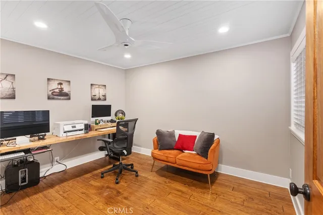 a workspace with furniture and a window