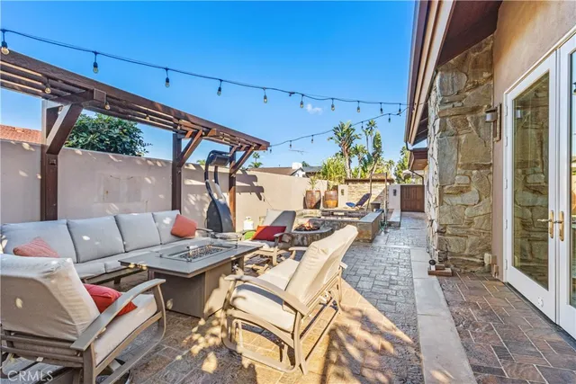 a view of yard with patio