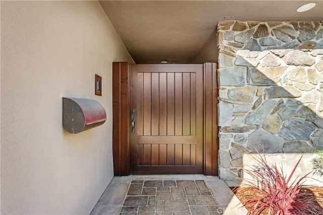 a view of a door and a window