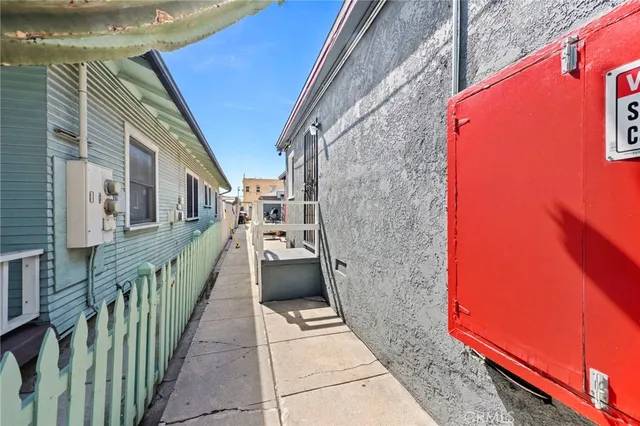 a view of a door and wooden floor