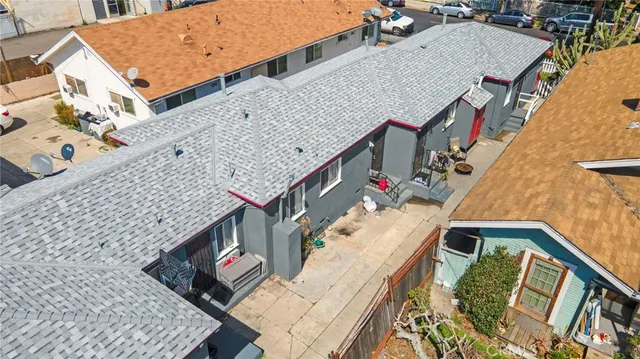 a view of balcony with wooden floor and outdoor seating