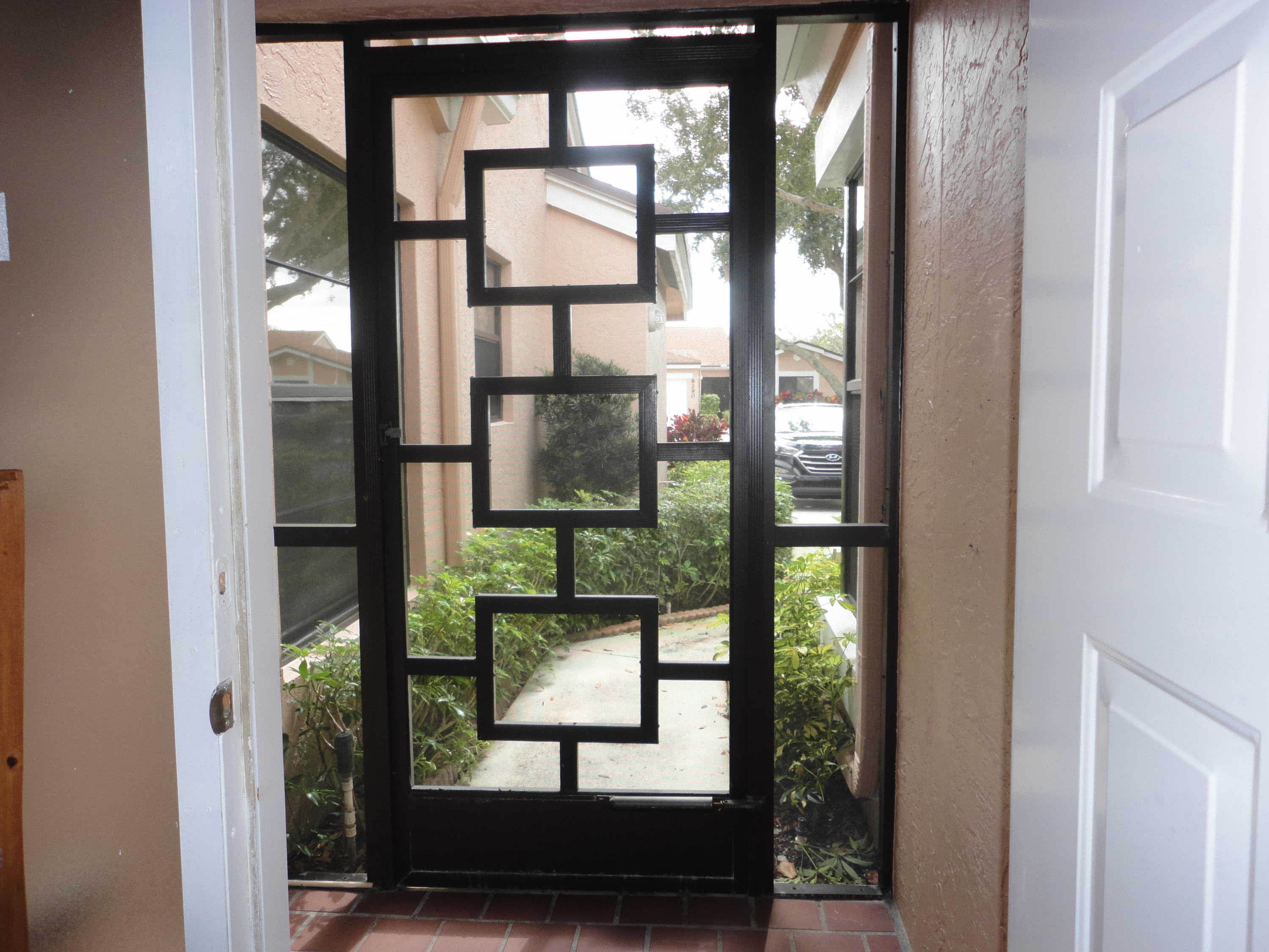 8291 Springlake Drive, Unit A Boca Raton, FL 33496 - Photo 3 of 41 Screened Atrium