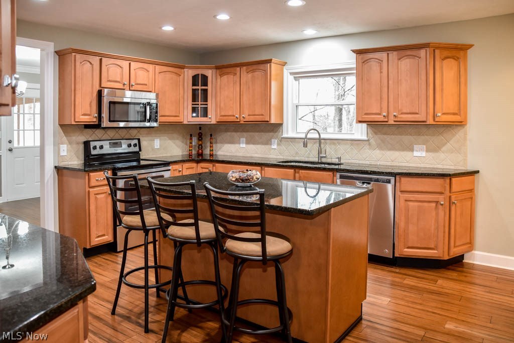 340 Kenridge Road Akron, OH 44333 - Photo 5 of 21 The kitchen has a center island with a breakfast bar.