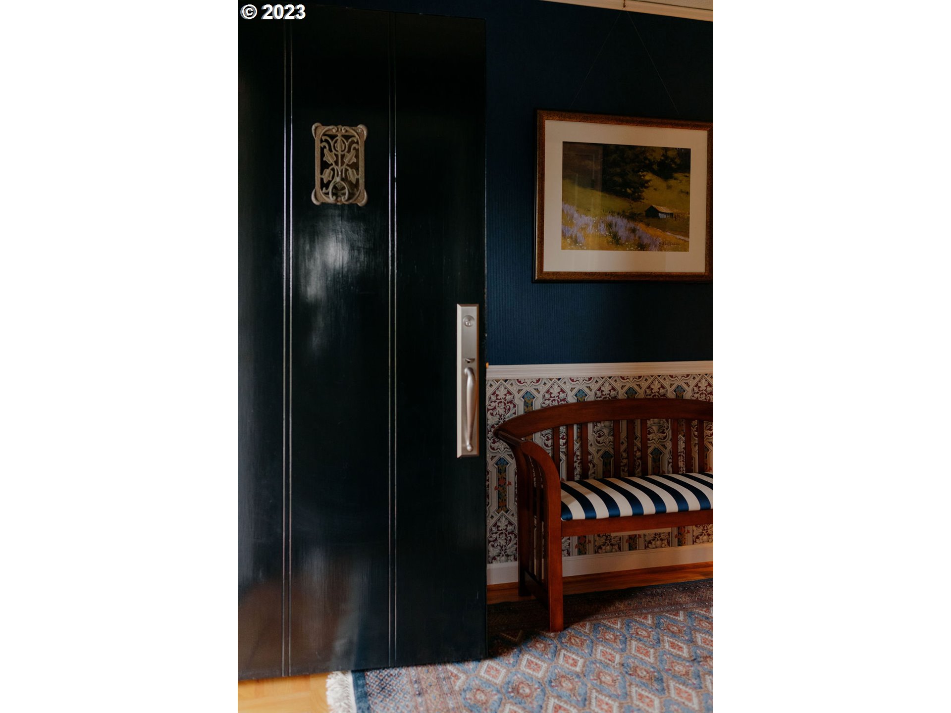 805 Northwest Skyline Crest Road Portland, OR 97229 - Photo 3 of 45 a picture of a bench in front of a door