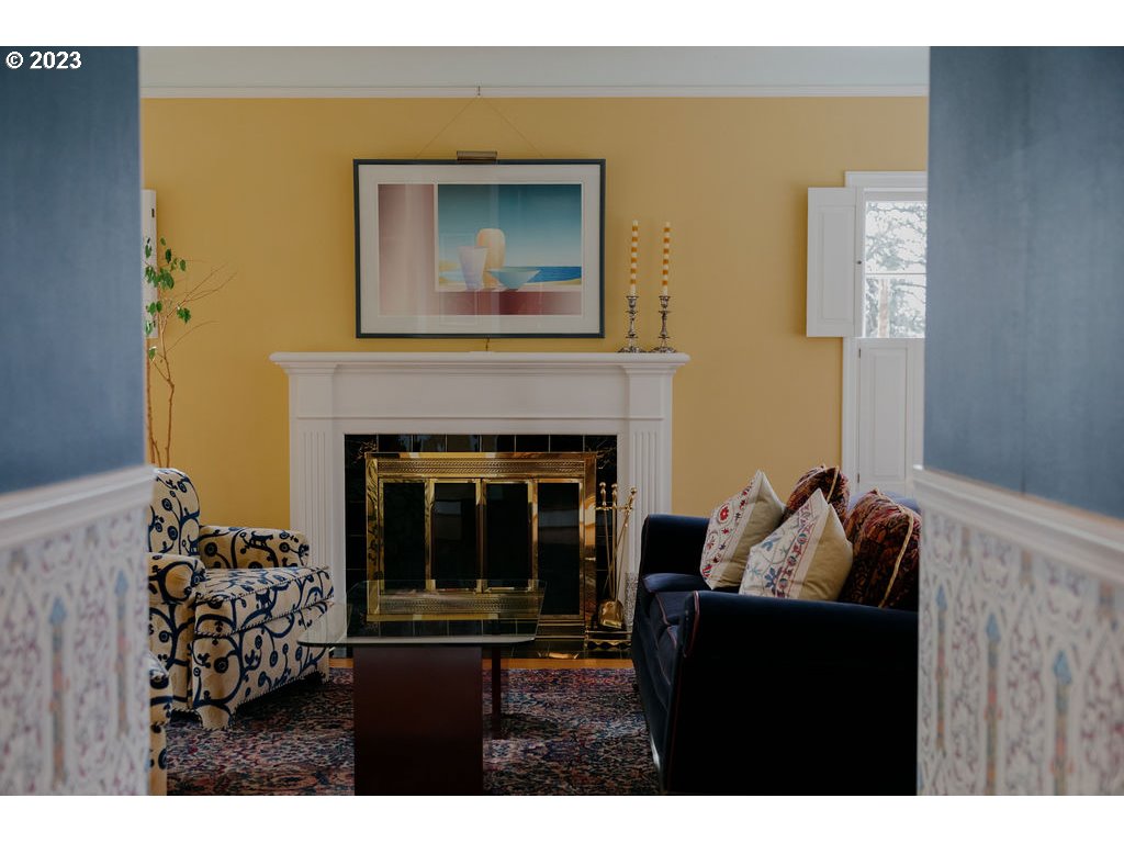 805 Northwest Skyline Crest Road Portland, OR 97229 - Photo 5 of 45 a living room with furniture and a fireplace