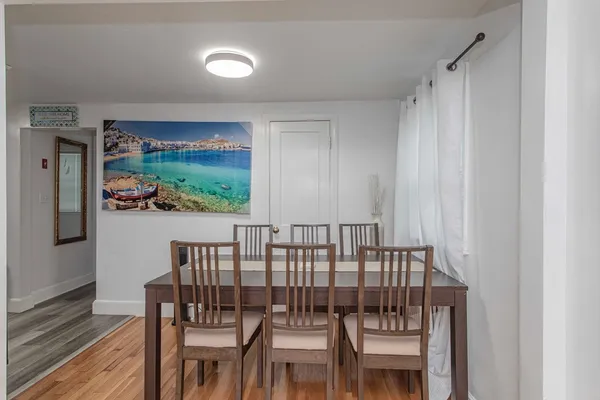 a view of a balcony with chairs