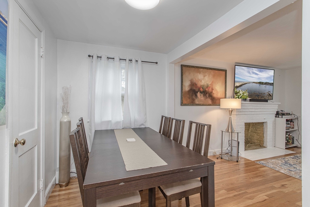 7 Scannell Road Randolph, MA 02368 - Photo 17 of 34 a living room with furniture and a fireplace