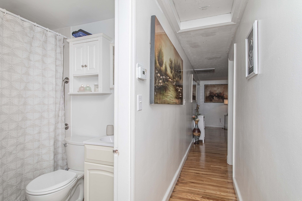 7 Scannell Road Randolph, MA 02368 - Photo 24 of 34 a bathroom with a toilet sink and a shower