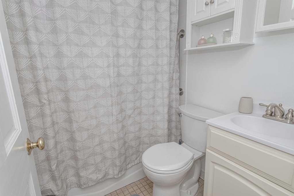 7 Scannell Road Randolph, MA 02368 - Photo 25 of 34 a bathroom with a sink and a toilet