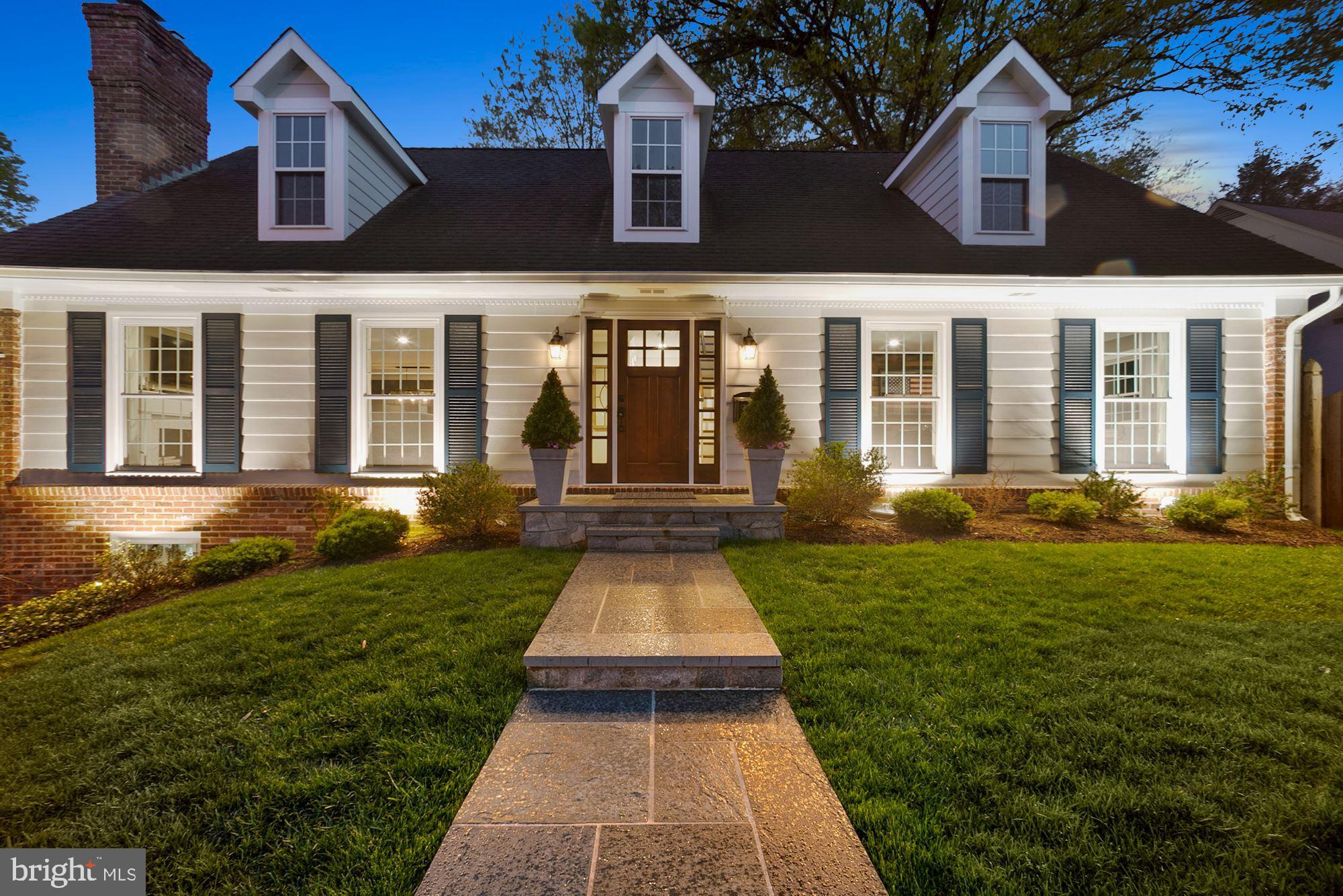 5500 Pollard Road Bethesda, MD 20816 - Photo 4 of 70 front view of a house with a yard