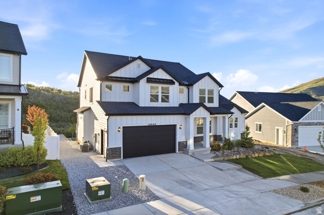 14648 South Springtime Road Draper, UT 84020 - Photo 3 of 47 Modern farmhouse style exterior featuring white siding and black trim accents