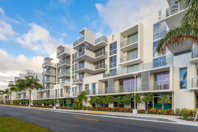 a view of a building with a street