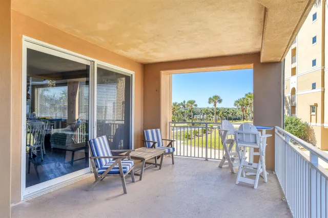 a view of a porch with furniture