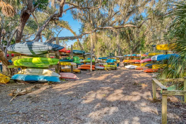 a view of a balcony with wooden floor