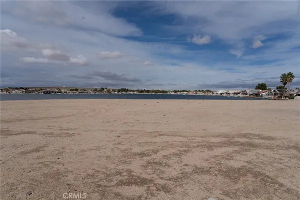 a view of a large body of water and mountain