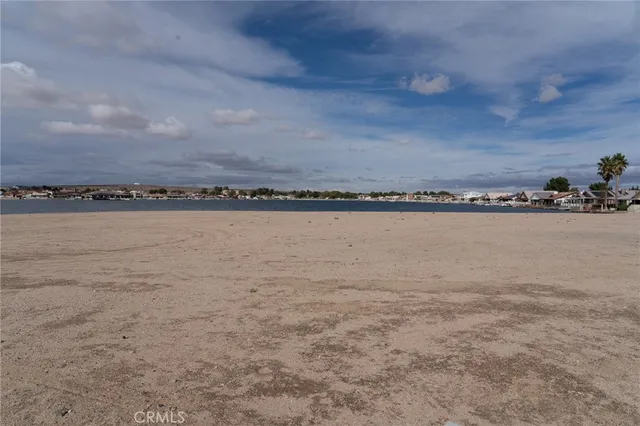 a view of a large body of water and mountain