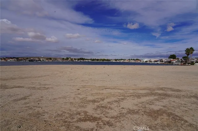 a view of a lake and sunset