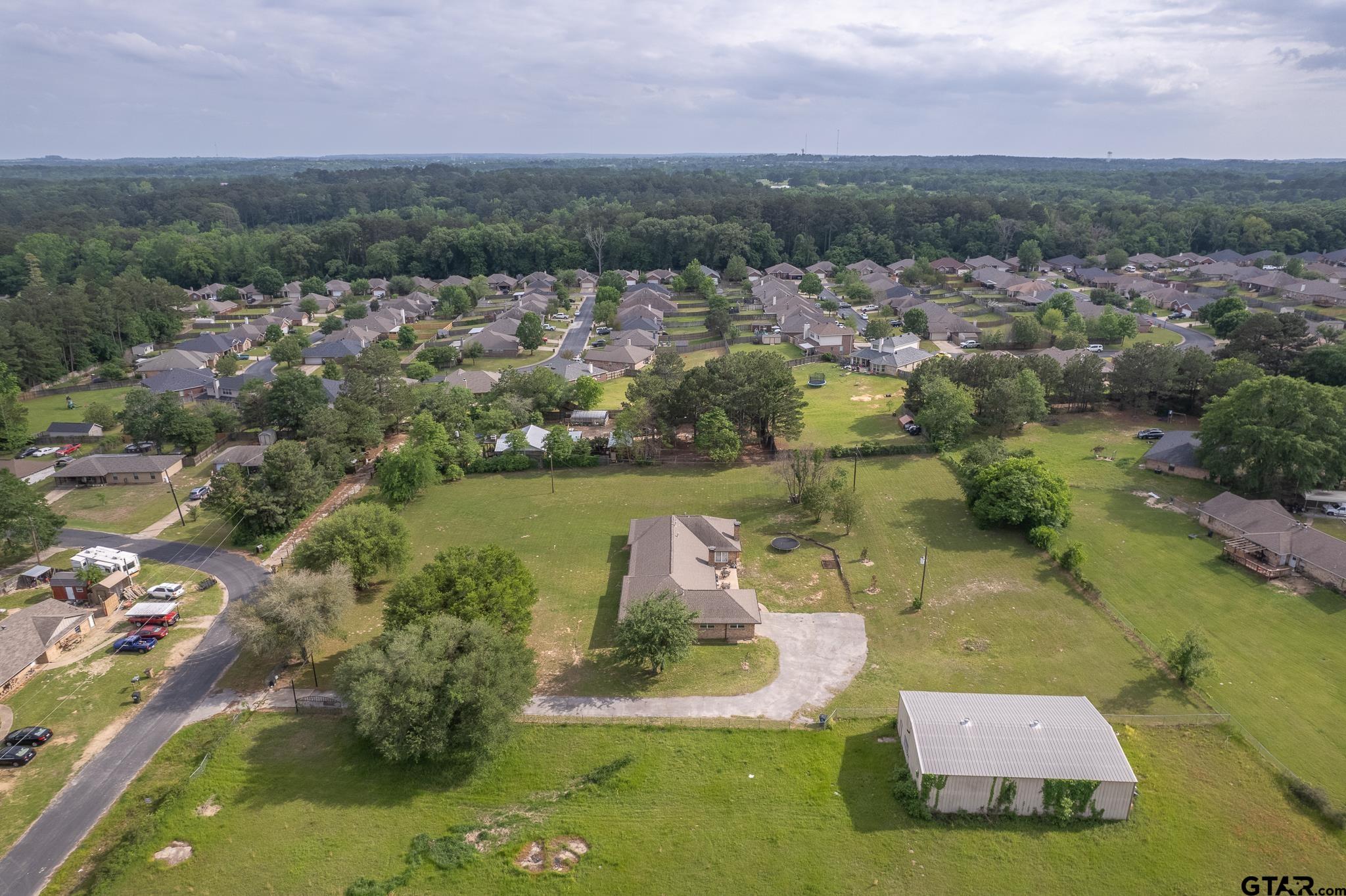 2201 Ridgley Tyler, TX 75703 - Photo 40 of 42 an aerial view of a house with a yard