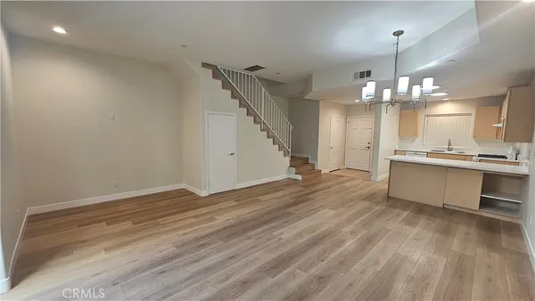 a view of a kitchen with a sink and dishwasher kitchen view