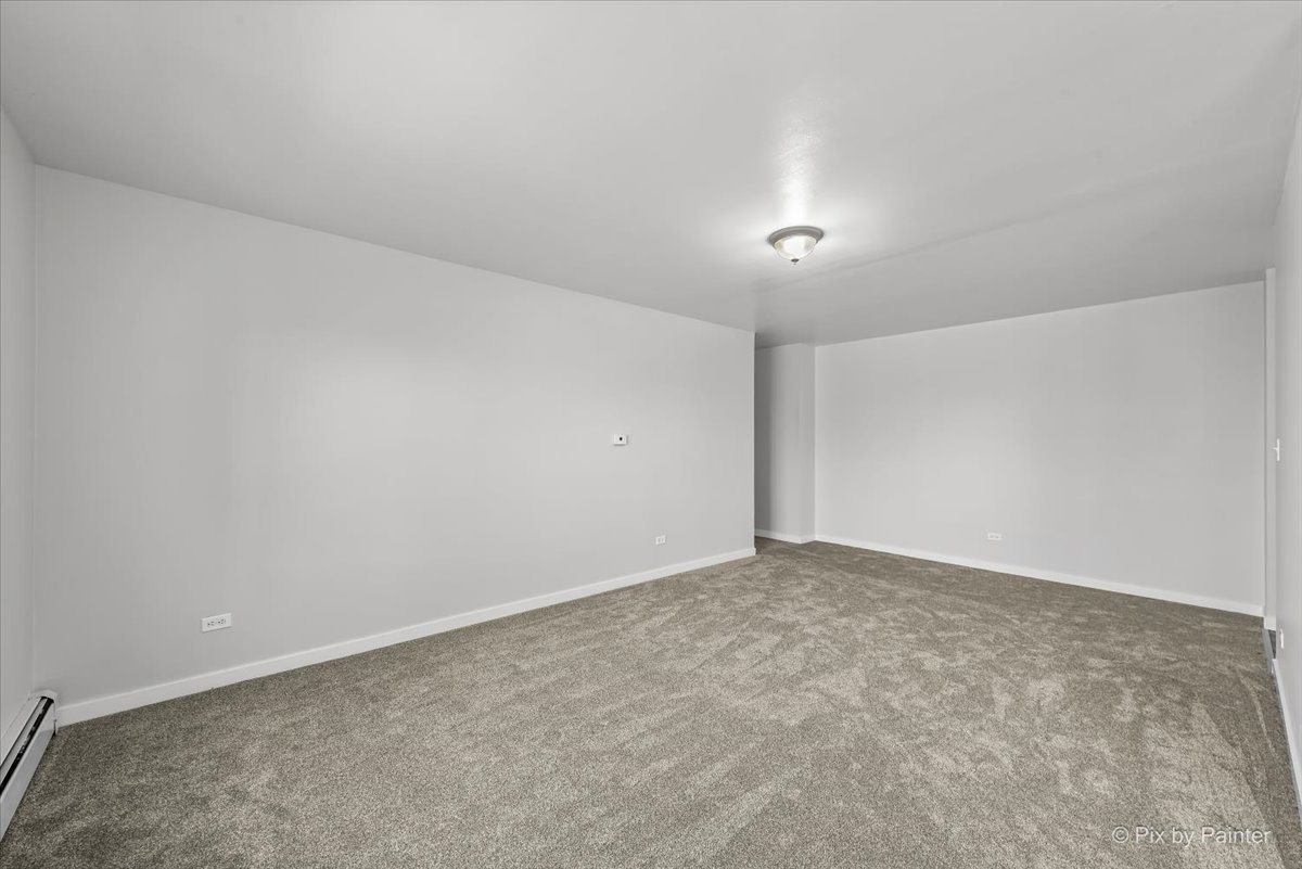 681 Elmhurst Road, Unit E Mount Prospect, IL 60056 - Photo 15 of 20 a view of an empty room