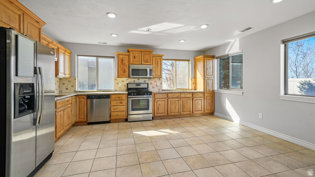 45 North 970 W Street Orem, UT 84057 - Photo 26 of 45 Basement kitchen with a lot of windows for natural lighting