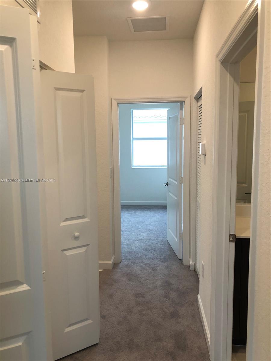 2610 Southeast 13th Street Homestead, FL 33035 - Photo 12 of 17 a view of a hallway with an empty room