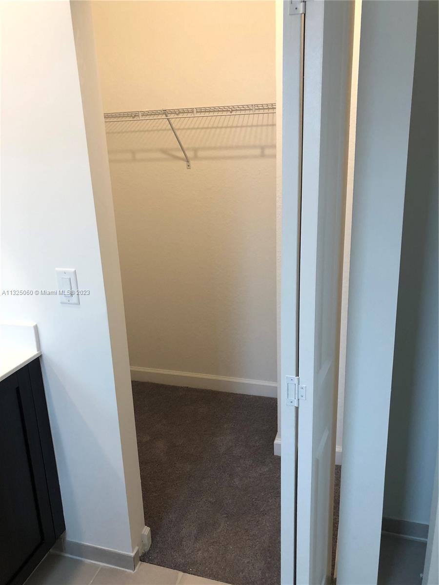 2610 Southeast 13th Street Homestead, FL 33035 - Photo 15 of 17 a view of closet