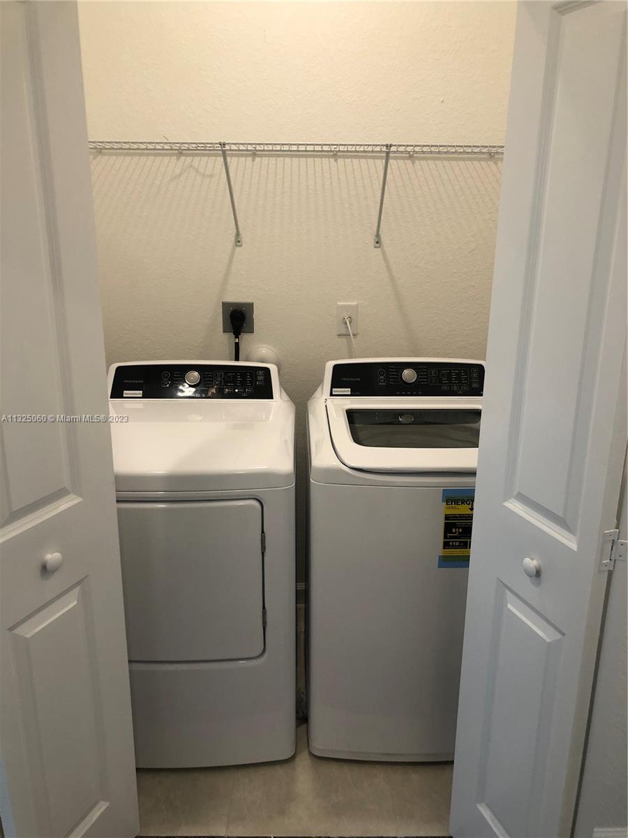 2610 Southeast 13th Street Homestead, FL 33035 - Photo 16 of 17 a utility room with dryer and washer