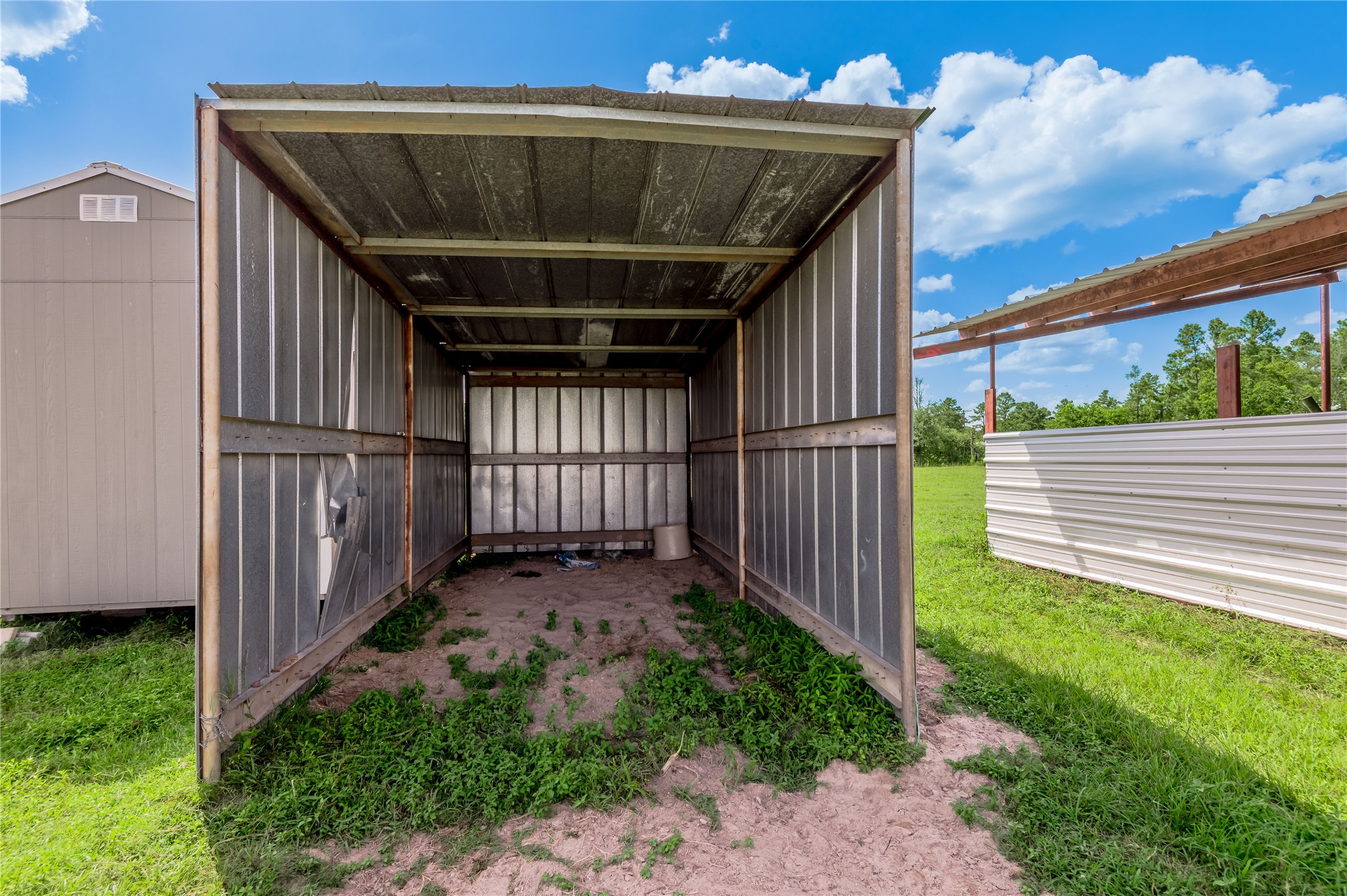 998 East 1st Street Groveton, TX 75845 - Photo 23 of 25 a view of backyard with green space
