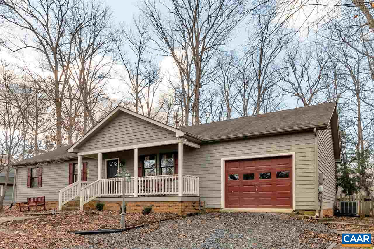 66 Laguna Road Palmyra, VA 22963 - Photo 3 of 50 a front view of a house with a yard and garage