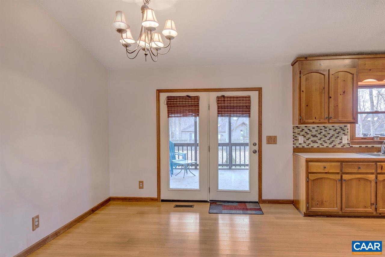 66 Laguna Road Palmyra, VA 22963 - Photo 8 of 50 a view of an empty room with wooden floor and a window