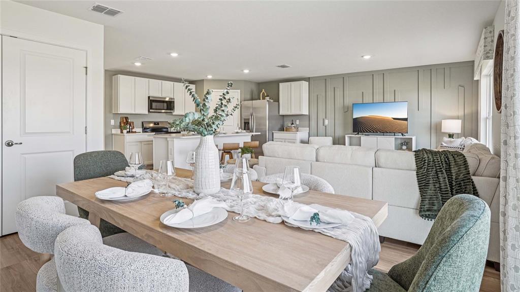 5803 Southwest 132nd Place Ocala, FL 34473 - Photo 15 of 25 a view of a dining room with furniture
