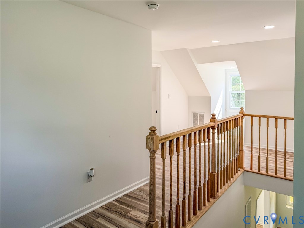19614 Manson Church Road McKenney, VA 23872 - Photo 15 of 24 a view of a hallway with wooden floor and staircase