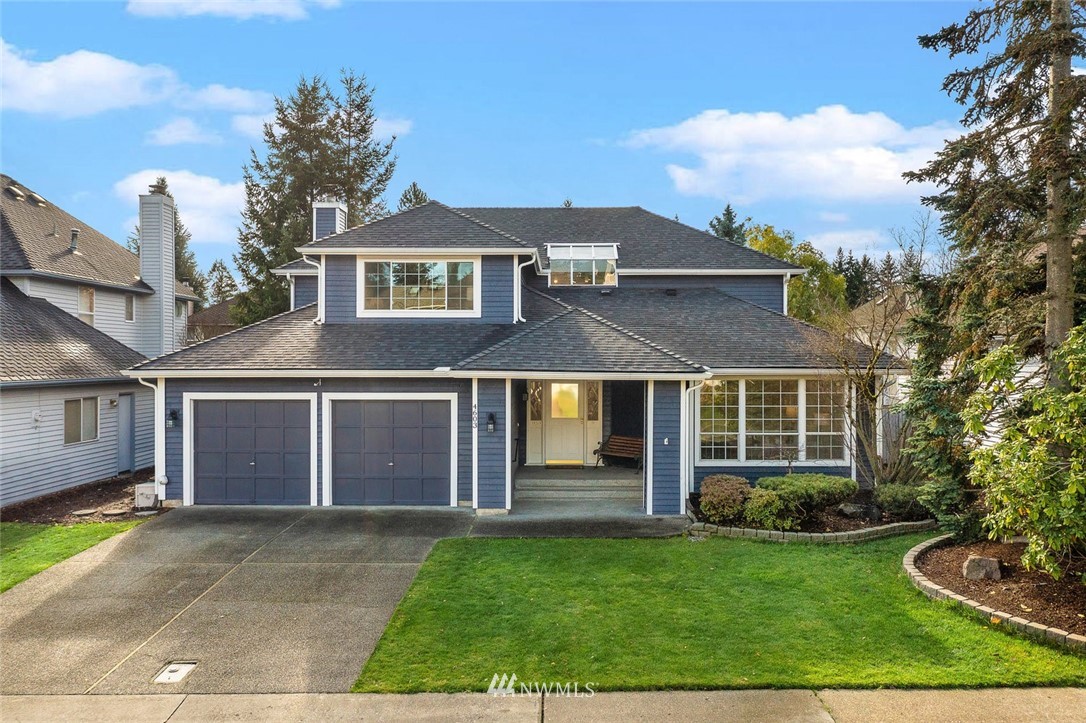 4603 Northeast 19th Street Renton, WA 98059 - Photo 1 of 30 front view of a house with a garden