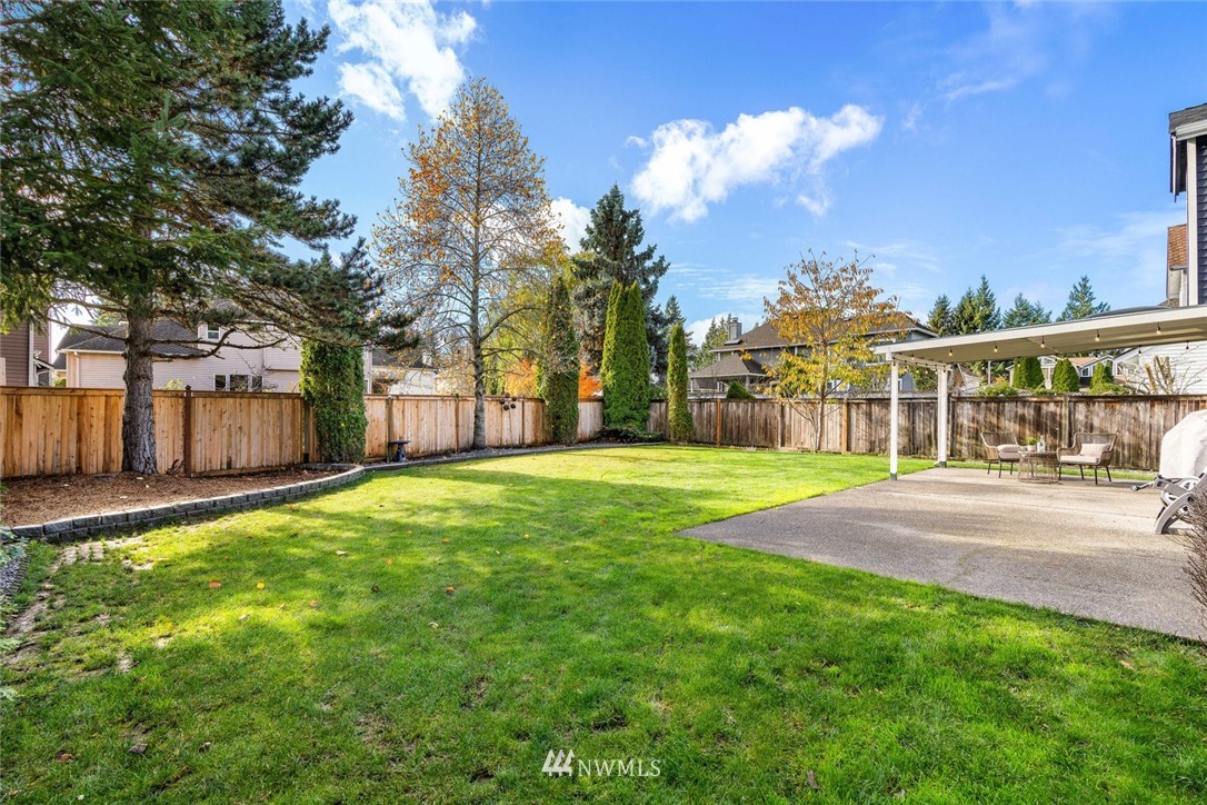 4603 Northeast 19th Street Renton, WA 98059 - Photo 26 of 30 a view of a house with backyard and tree