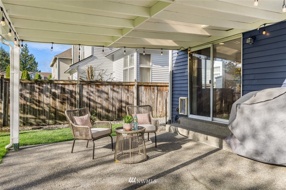 4603 Northeast 19th Street Renton, WA 98059 - Photo 29 of 30 a building outdoor space with patio furniture and potted plants