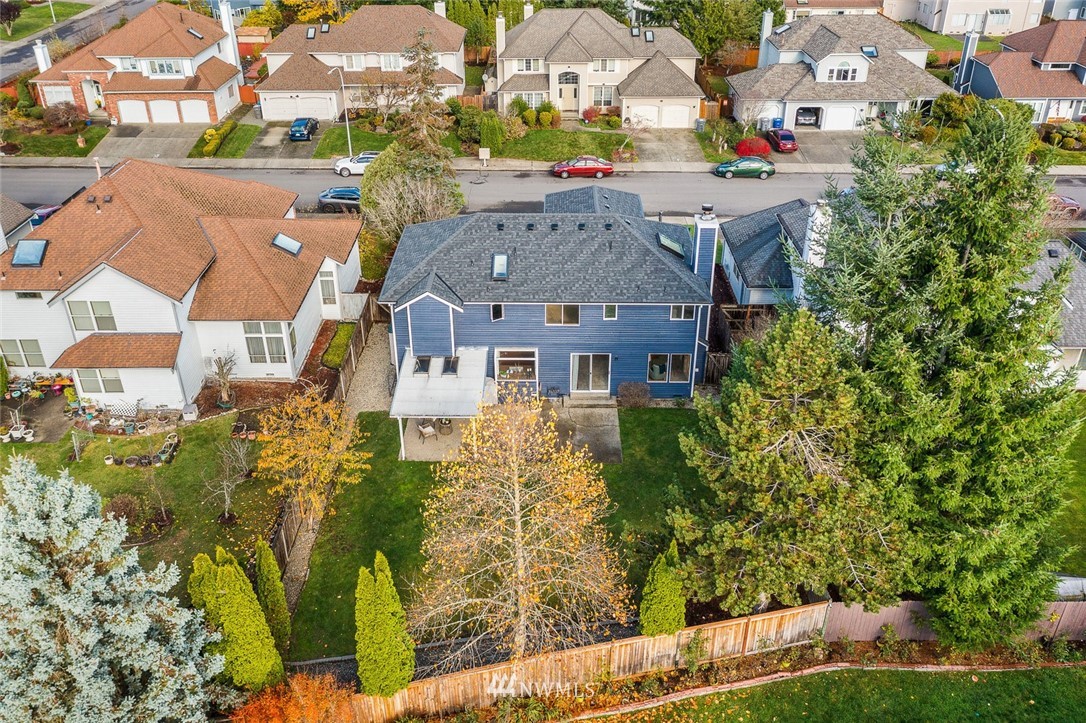 4603 Northeast 19th Street Renton, WA 98059 - Photo 4 of 30 an aerial view of a house with a yard basket ball court and outdoor seating